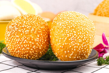 Golden Fried Sesame Balls Traditional Chinese Sichuan Snacks on Plate