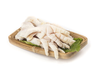 Fresh Raw Chicken Feet Claws in Bamboo Basket Ready for Asian Cooking