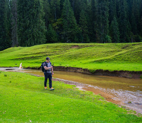Hiker filming Ponor creek sinkholes