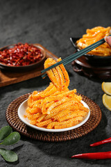 Spicy Konjac Vegetable Strips with Chopsticks and Chili Sauce Asian Food Photography