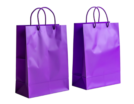 Two slightly crumpled purple paper shopping bags with black twisted handles, angled, set against a black background