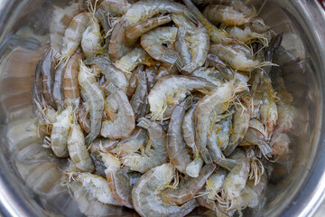 Fresh white tiger prawns or raw whiteleg prawns, without heads.