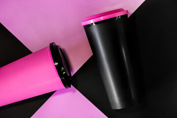 Sleek Tumblers: Artistic, minimalist composition, showcasing two stylish tumblers with a...