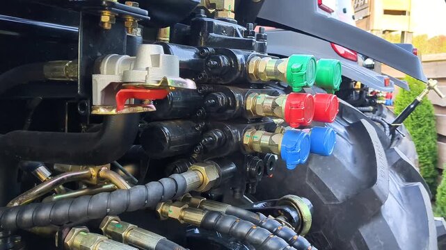 Tractor hydraulic quick release couplings.