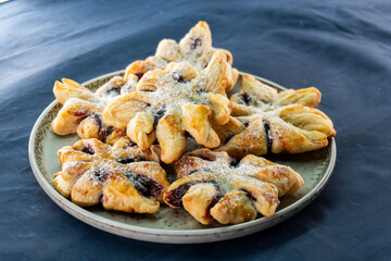 Puff pastry flower with jam filling. Baking. Desserts. Food concept.