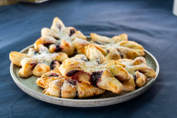 Puff pastry flower with jam filling. Baking. Desserts. Food concept.