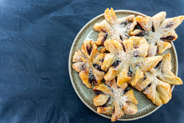 Puff pastry flower with jam filling. Baking. Desserts. Food concept.