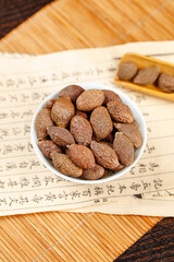 Chinese Dried Dates Jujube Fruit in Bowl Traditional Medicine Healthy Snack Natural Food