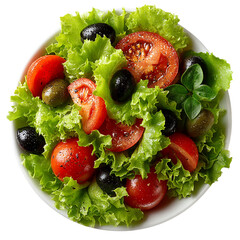 A vibrant salad bowl featuring fresh lettuce tomatoes and olives on a white background top down view shot