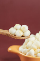 Fresh Peeled Corn Kernels on Wooden Spoon - Healthy Breakfast Food Ingredient