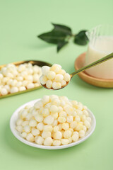 Fresh corn kernels without skin and germ in bowl - healthy breakfast ingredient