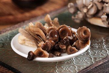 Assorted Dried Mushrooms on White Plate - Natural Cooking Ingredients and Culinary Food Components