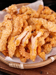 Crispy Golden Fried Chicken Strips in Bamboo Basket - Gourmet Comfort Food Snacks