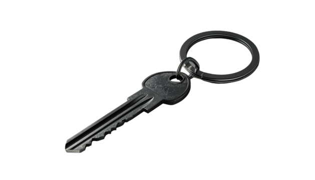 A dark grey metal key attached to a simple, circular keyring, angled slightly to the right against a black background