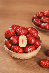 Hotan Jujube Dates from Xinjiang China in Wooden Bowls - Traditional Dried Red Fruit
