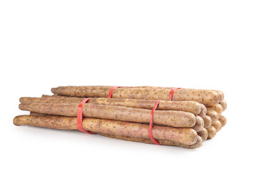 Fresh Chinese Yam Sticks with Red Bands on White Background - Henan Traditional Root Vegetable