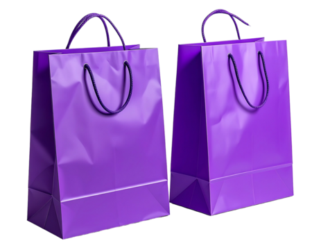 Two identical, slightly crumpled, deep purple paper shopping bags with dark handles stand side-by-side against a black background