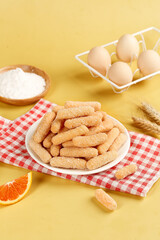 Traditional Chinese Glutinous Rice Sticks Beijing Snack with Cooking Ingredients on Yellow Background