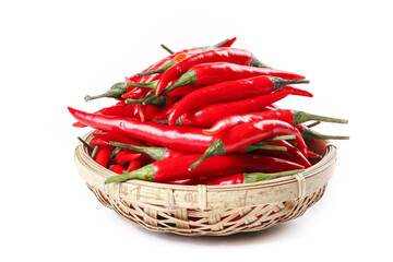 Fresh Red Hot Chili Peppers in Traditional Woven Basket on White Background