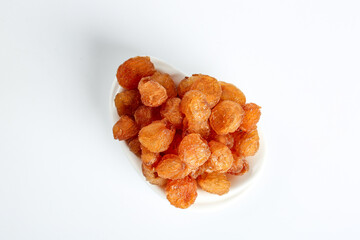 Dried Longan Fruits from Yunnan China - Golden Cinnamon Flesh Preserved Asian Snack on White Background