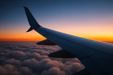 Airplane wing view above clouds during colorful sunset sky, capturing serene travel moment with soft light in abstract natural background atmosphere. Ai generative