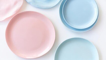 Pastel plates in soft pink and blue invite a fresh, modern table setting for spring brunch celebrations or elegant dinner parties, adding a touch of serene style