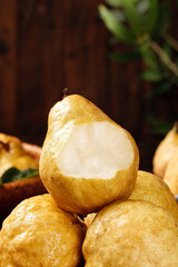 Fresh Chinese Pears with Soft Golden Skin Display in Rustic Wooden Basket