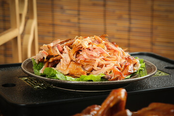 Air-Dried Chicken Jerky Strips with Fresh Lettuce in Ceramic Bowl - Healthy Protein Snack