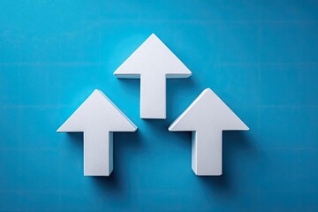 Three white upward-pointing arrows arranged in a loose triangular formation on a textured light-blue surface