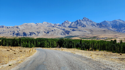 The scenery while traveling on rural road to Demirkazik Village on a sunny day.
