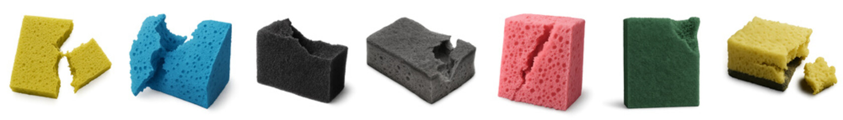 Colorful  torn sponges in various shapes arranged on white background  