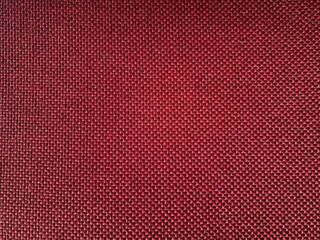 Red Woven Fabric Texture Closeup Background