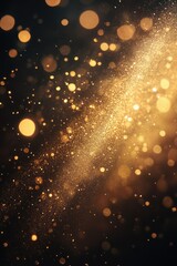 Obraz premium Golden dust and bokeh on dark background