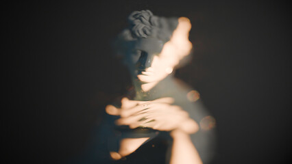 Antique sculpture of Apollo, soft focus effect, 3d model of classical sculpture. A golden ray of sunlight on the face, golden particles in the air, a mythical atmosphere
