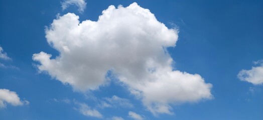 ‌A cloud in the sky resembling Superman‌