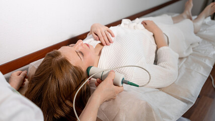Aesthetic treatment: microcurrent stimulation for facial contouring and improved blood flow