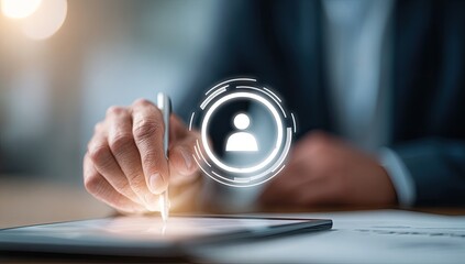 Close-up of a person's hand interacting with a tablet.  A person icon hovers over the screen.  Business-like setting