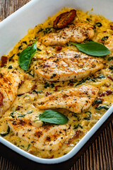 Creamy Tuscan chicken with parmesan cheese, spinach and sun dried tomatoes