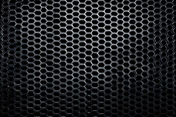 Dark metallic honeycomb grille