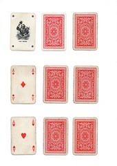 Fototapeta premium Three different hands of grubby vintage playing cards isolated on a white background.