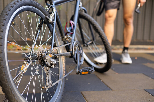 Bicycle repair tools on the pavement in the city. Close-up. repairing a flat bicycle tire. Bike maintenance. - Powered by Adobe