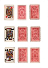 Fototapeta premium Three different hands of grubby vintage playing cards isolated on a white background.