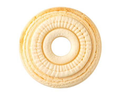 A pale yellow, ring-shaped cookie with concentric embossed circles and a central hole, showing a slightly textured surface - Powered by Adobe