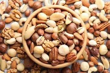 Mix of different nuts on table, flat lay