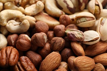 Mix of different nuts as background, closeup