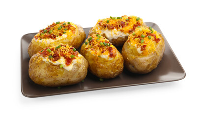 Tasty baked potatoes with stuffing isolated on white