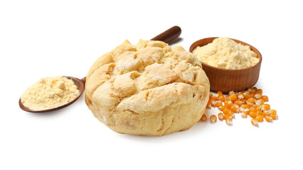 Freshly baked cornbread loaf, flour and seeds isolated on white