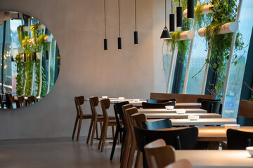 Tables and chairs in a restaurant interior
