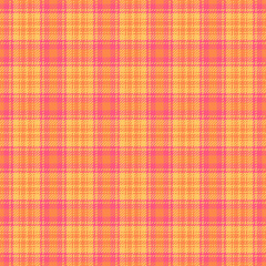 Seamless fabric pattern in warm tones. A classic tartan with vibrant colors, ideal for textiles, fashion, or background use. A touch of tradition, modern feel.