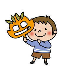 落ち葉のお面を持つ子供（男の子1）
